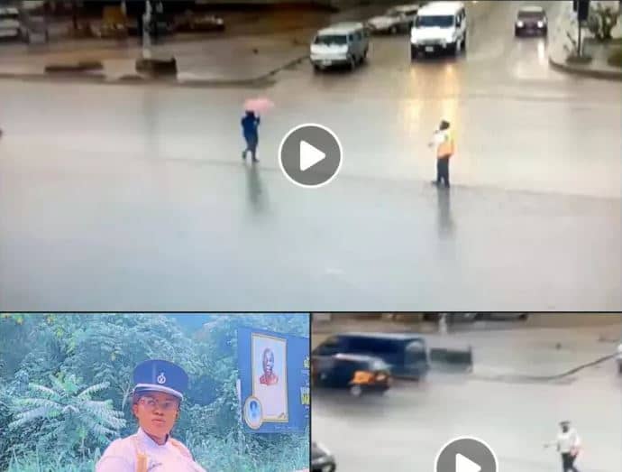 Policewoman applauded for directing traffic under heavy downpour in Accra