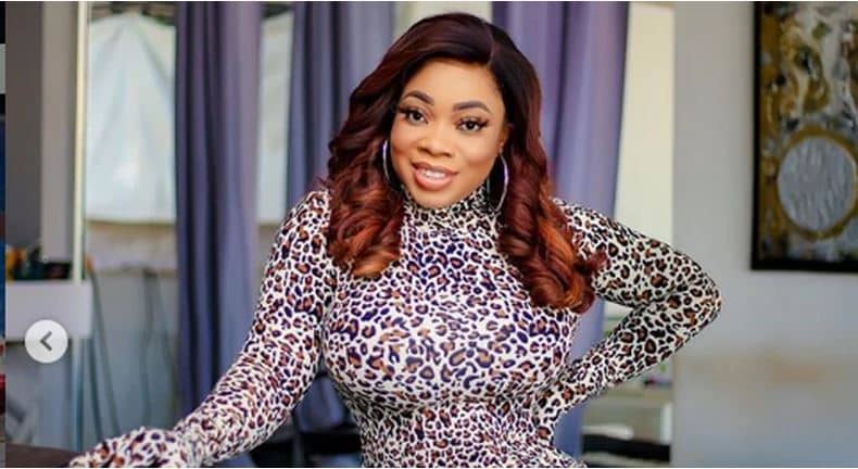 Moesha Buduong posing with a wide smile